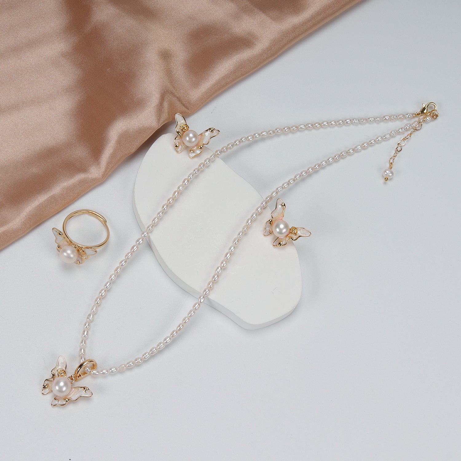 New Design Natural Freshwater White rice-shaped Pearl Necklace, Butterfly Earrings, Ring, and Pendant Set for Women girls