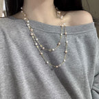 Hot selling Natural Freshwater white pink oval pearl necklace sweater chain, Fashionable handmade design pearl necklace for women