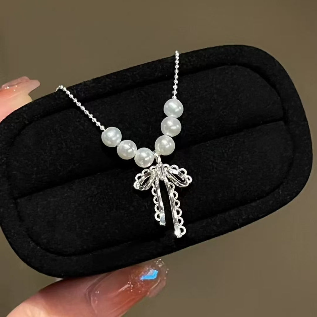 Hot selling Natural Freshwater white pearl bow necklace, Fashionable and exquisite pearl necklace for women