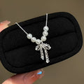 Hot selling Natural Freshwater white pearl bow necklace, Fashionable and exquisite pearl necklace for women