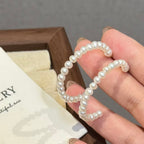 Natural Freshwater white round pearl double C earrings, fashionable high-end pearl earrings for women