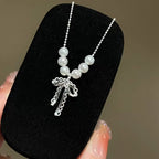 Hot selling Natural Freshwater white pearl bow necklace, Fashionable and exquisite pearl necklace for women
