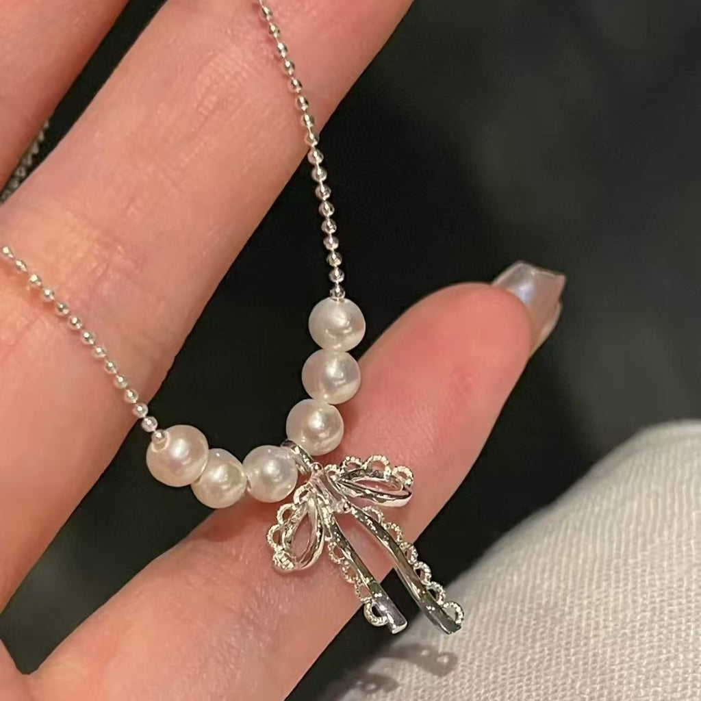 Hot selling Natural Freshwater white pearl bow necklace, Fashionable and exquisite pearl necklace for women