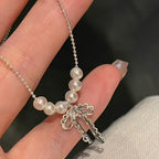 Hot selling Natural Freshwater white pearl bow necklace, Fashionable and exquisite pearl necklace for women