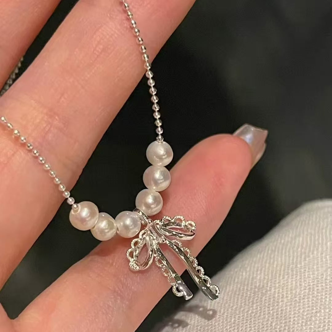 Hot selling Natural Freshwater white pearl bow necklace, Fashionable and exquisite pearl necklace for women